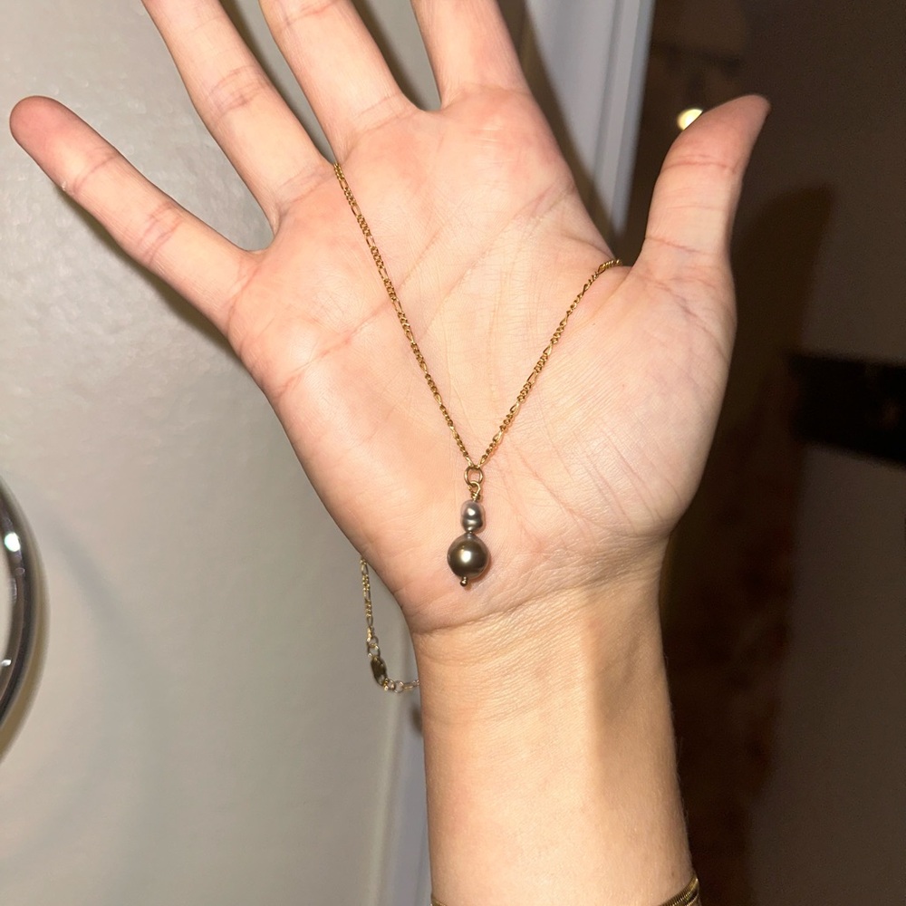 Elegant Gold and Black Pearl Necklace